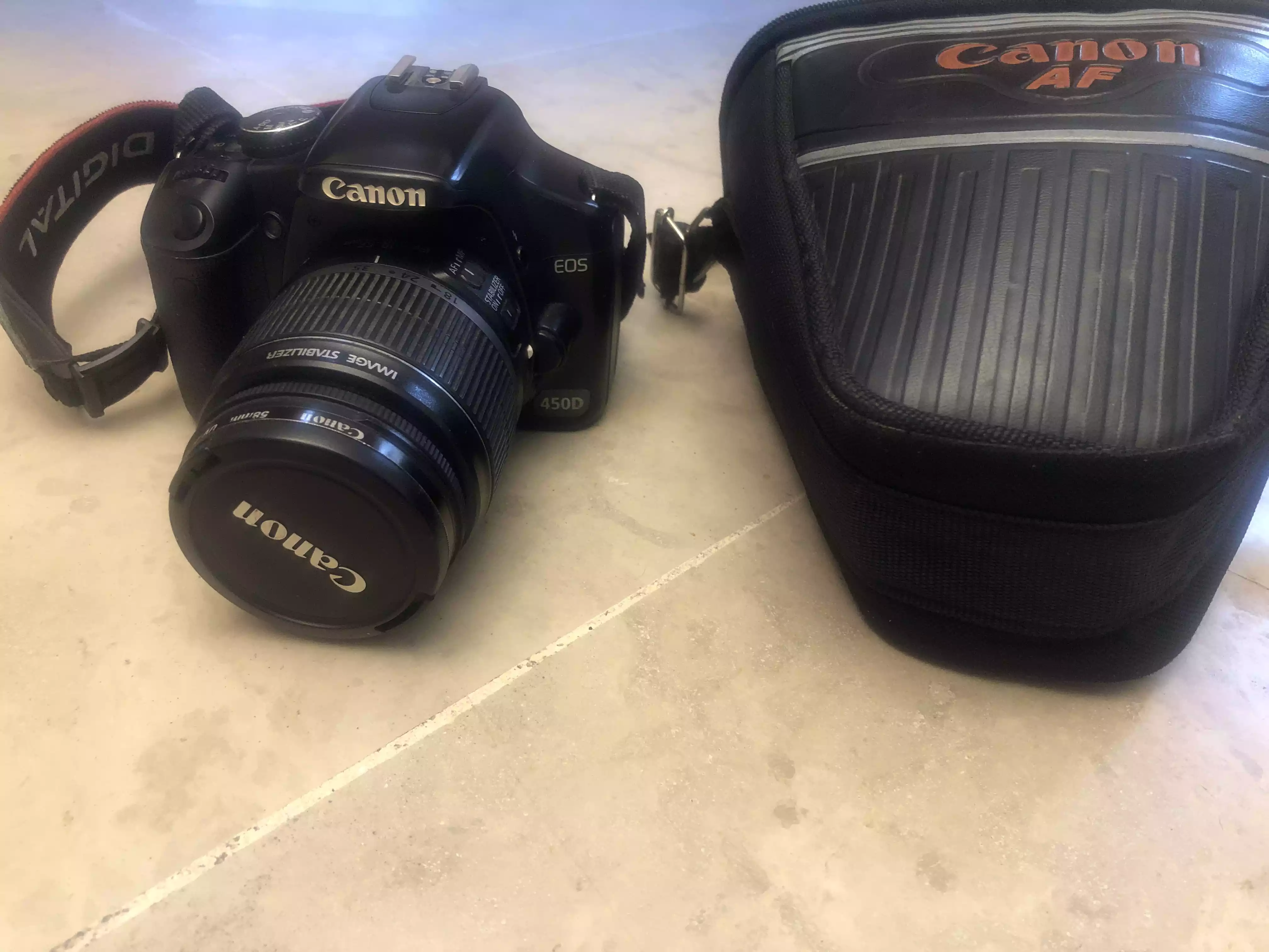 دوربین عکاسی کنون 450D دست دو