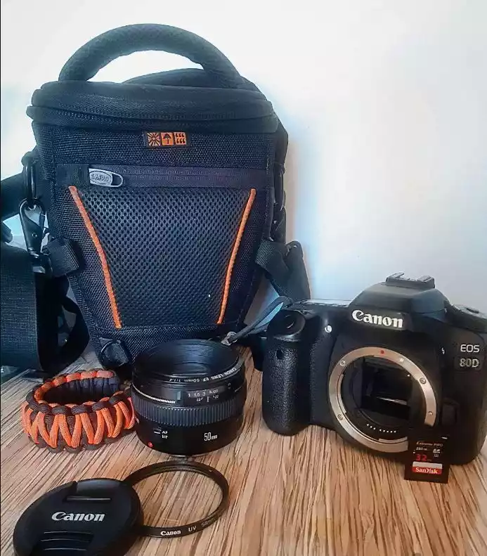 دوربین کنون canon 80d و لنز 50 1/4f و... دست دو