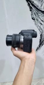 دوربین بدون آینه کانن R10 Kit 18-150mm f3.5-6.3 IS STM دست دوم