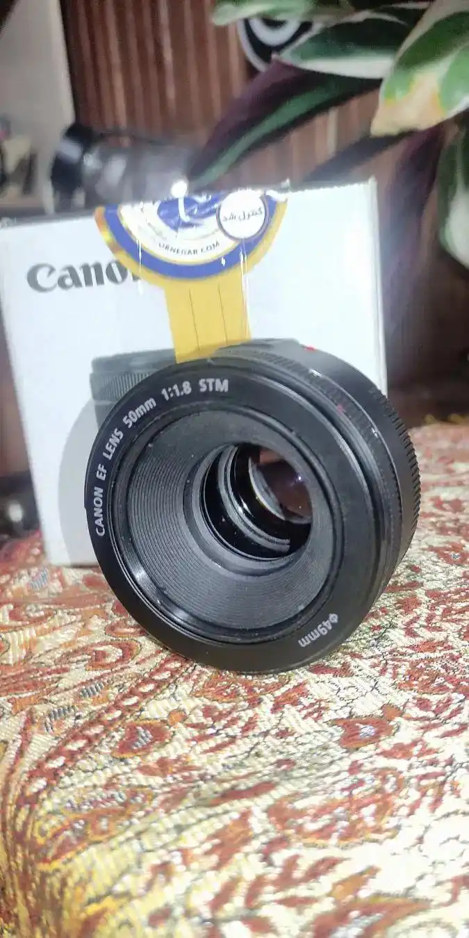 فروش فوری لنز50mm با f1.8 مشابه اکبند. دست دو