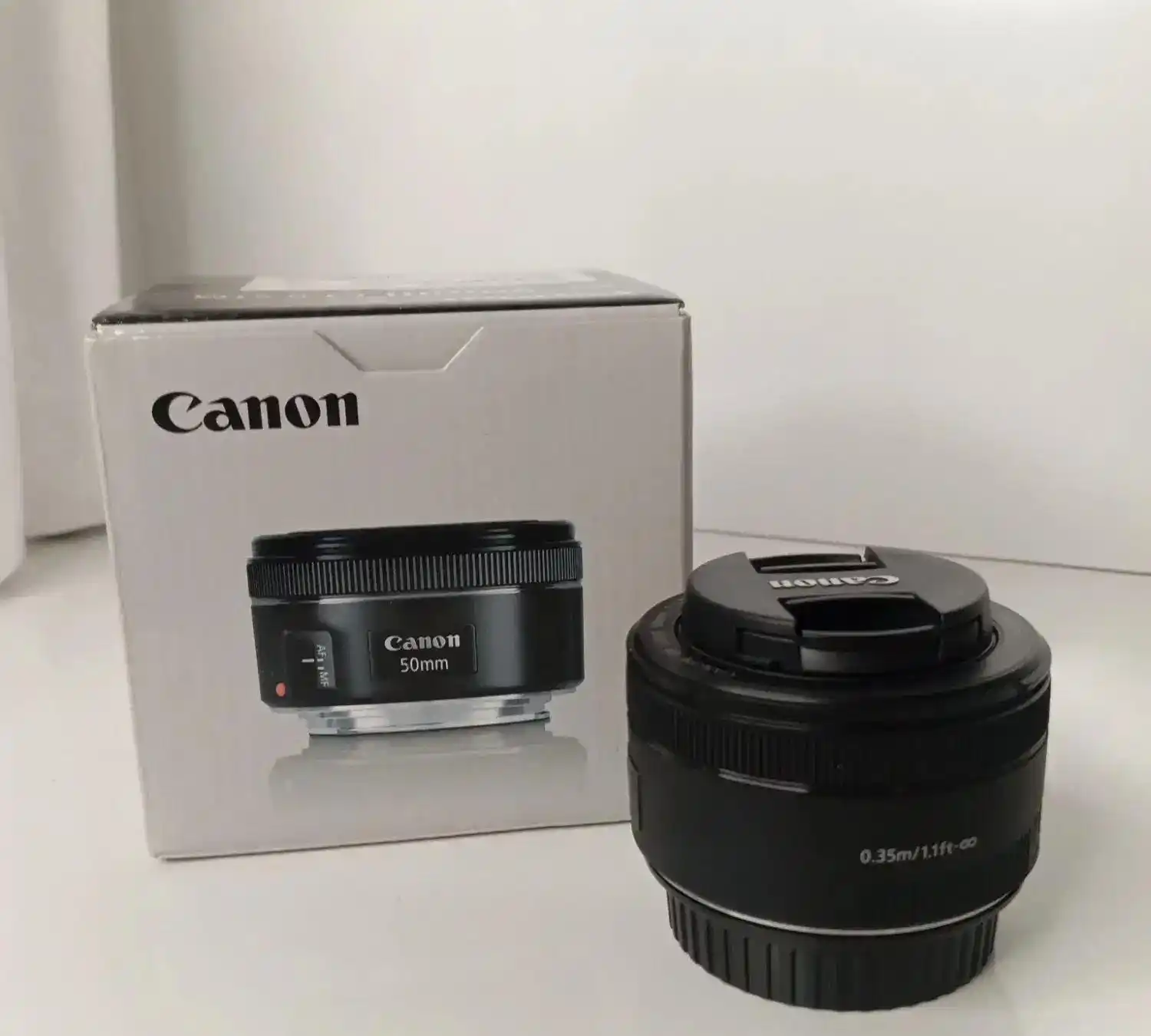 لنز canon EF 50mm f/1.8 دست دو