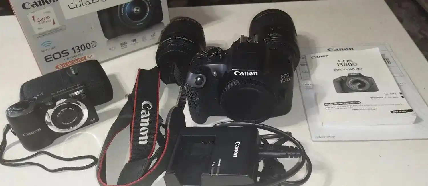 دوربین حرفه ای کنون 1300d دست دو