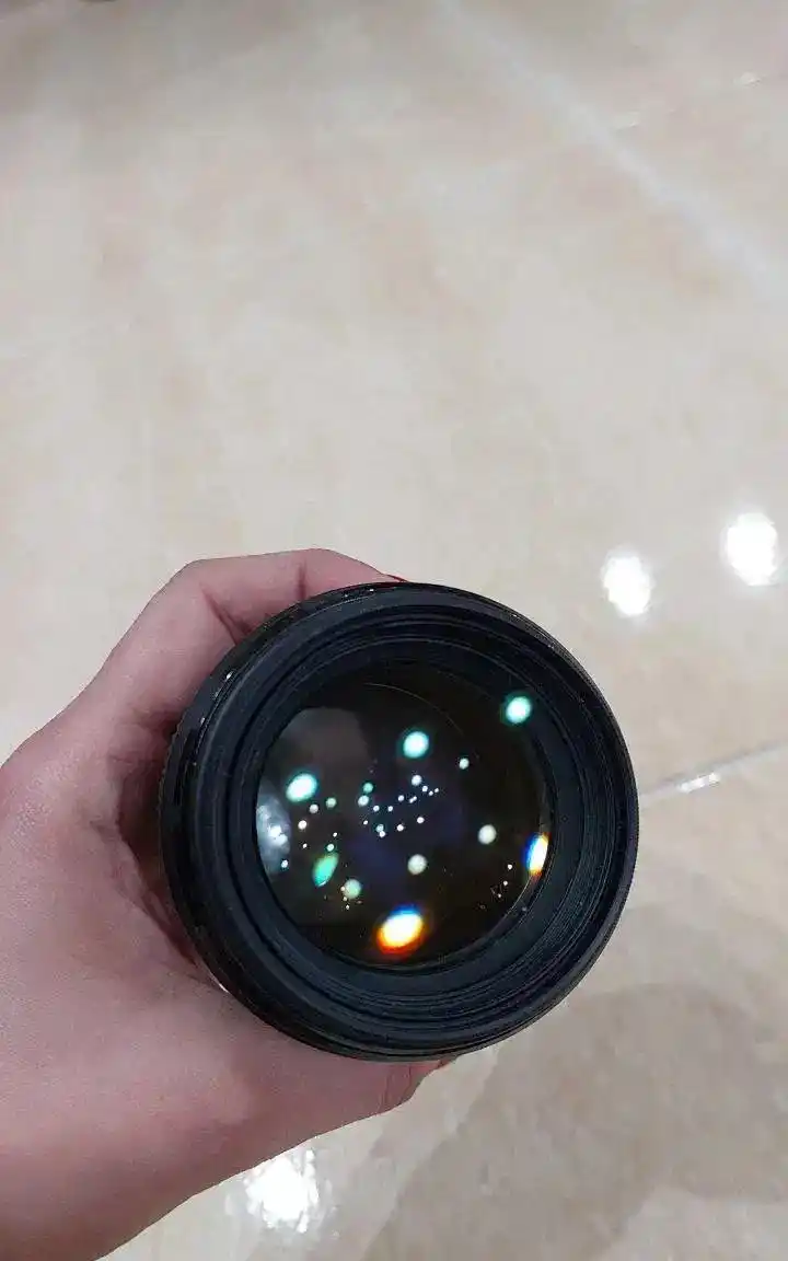 لنز 85mm F1.8 کنون با فیلتر پولاریزه(نو و کارکرده) دست دو