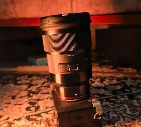 لنز پنجاه سیگما lens 50mm sigma DG f1.4 دست دو