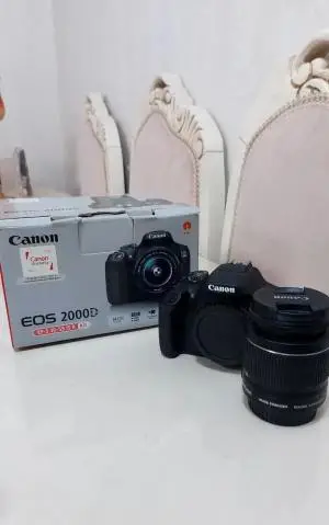 دوربین عکاسی کانن دست دوم Canon EOS 2000D kit EF-S 18-55mm f/3.5-5.6 IS stm(300 شات) دست دوم