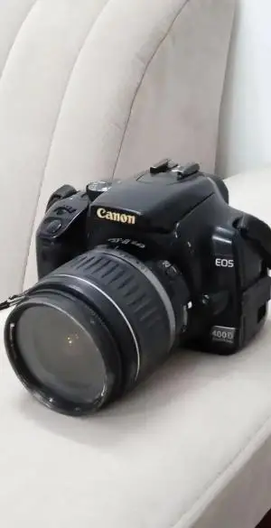 دوربین کانن400D با لنز اضافی 135-28و فلش 220-EX دست دوم