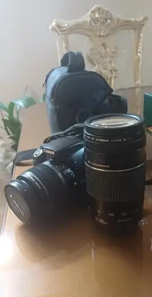 دوربین کانن400D با لنز اضافی 135-28و فلش 220-EX دست دوم