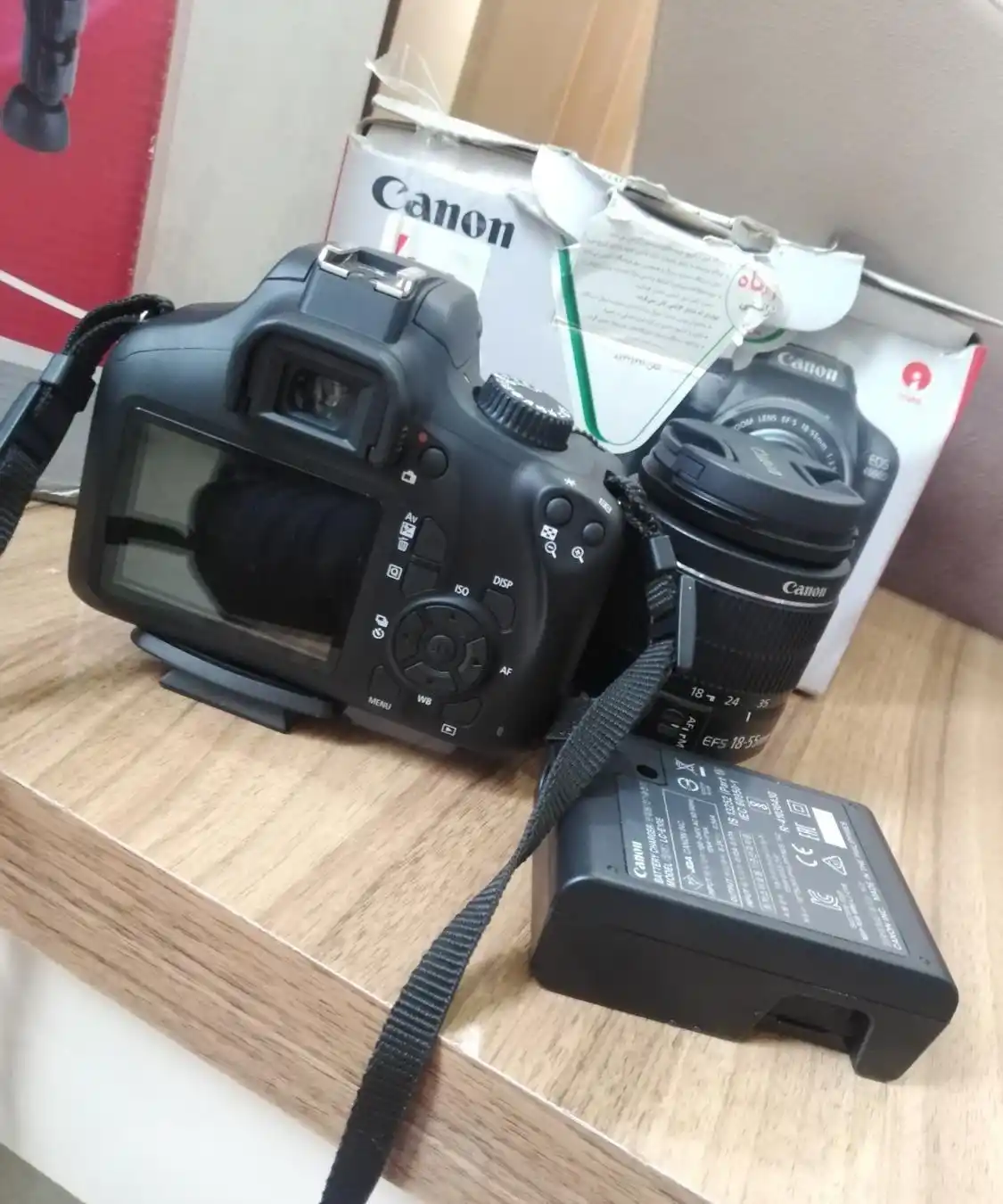 دوربین عکاسی 4000D کنون همراه با پایه دست دو