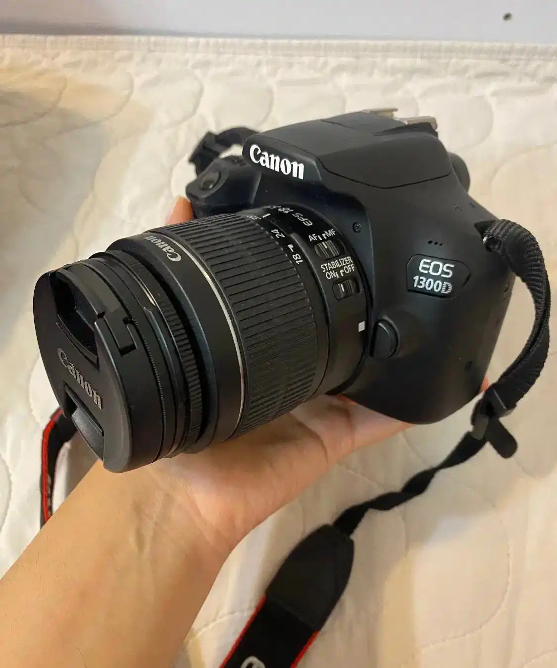دوربین کانن 1300d+لنز 188-55 میلی‌متر+ کیف دست دو