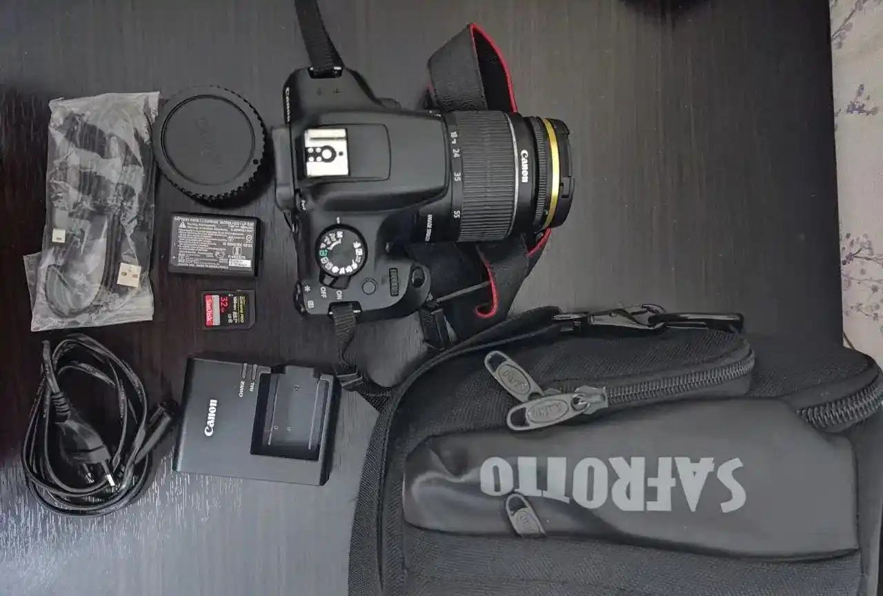 دوربین ۱۳۰۰d کنون + سه پایه + کیف و متعلقات دست دو