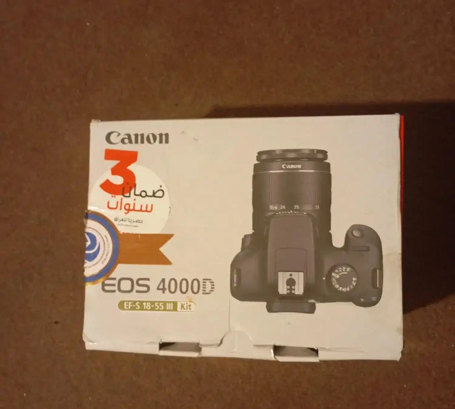 دوربین عکاسی کانون مدل D4000 دست دو