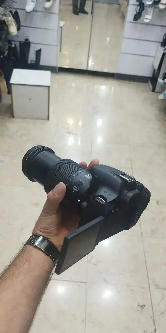 دوربین کنن 850 d با لنز 18 135 دست دو