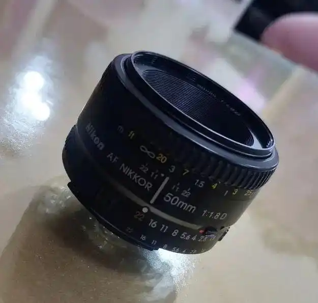 لنز فیکس نیکون 50mm f/1.8 D دست دو