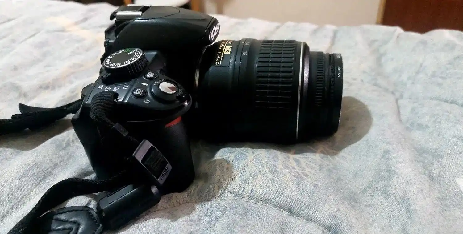 دوربین d3100 دست دو