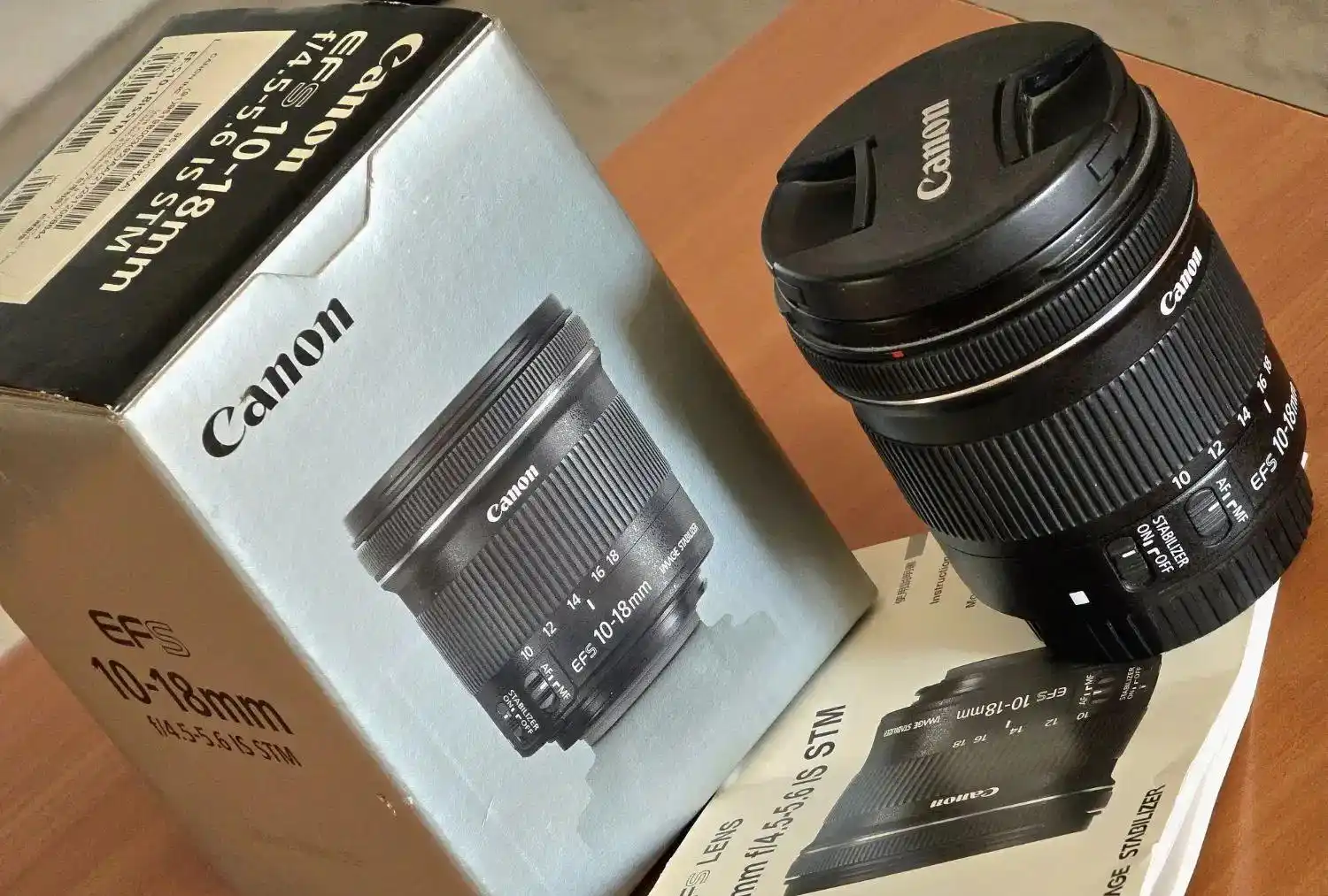 لنز دوربین کانن EF-S 10-18mm IS STM دست دو